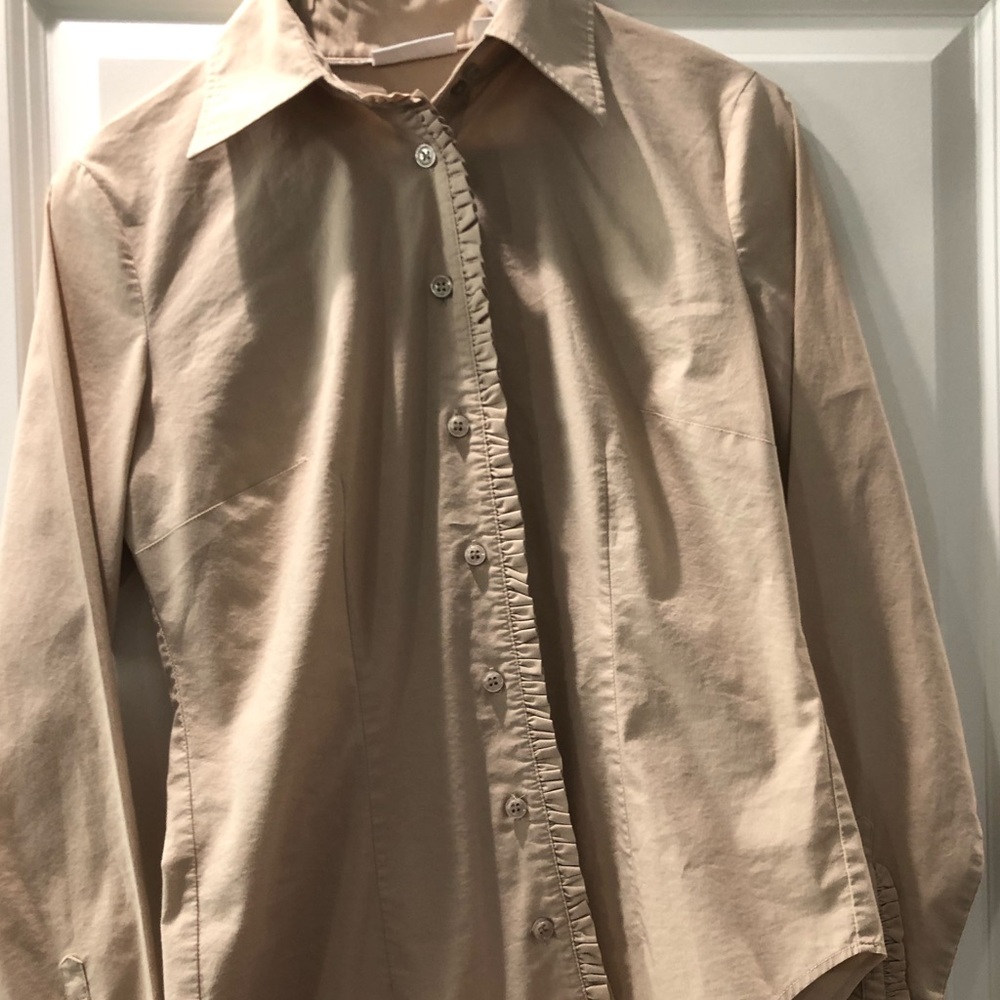 Ruffled tan blouse
